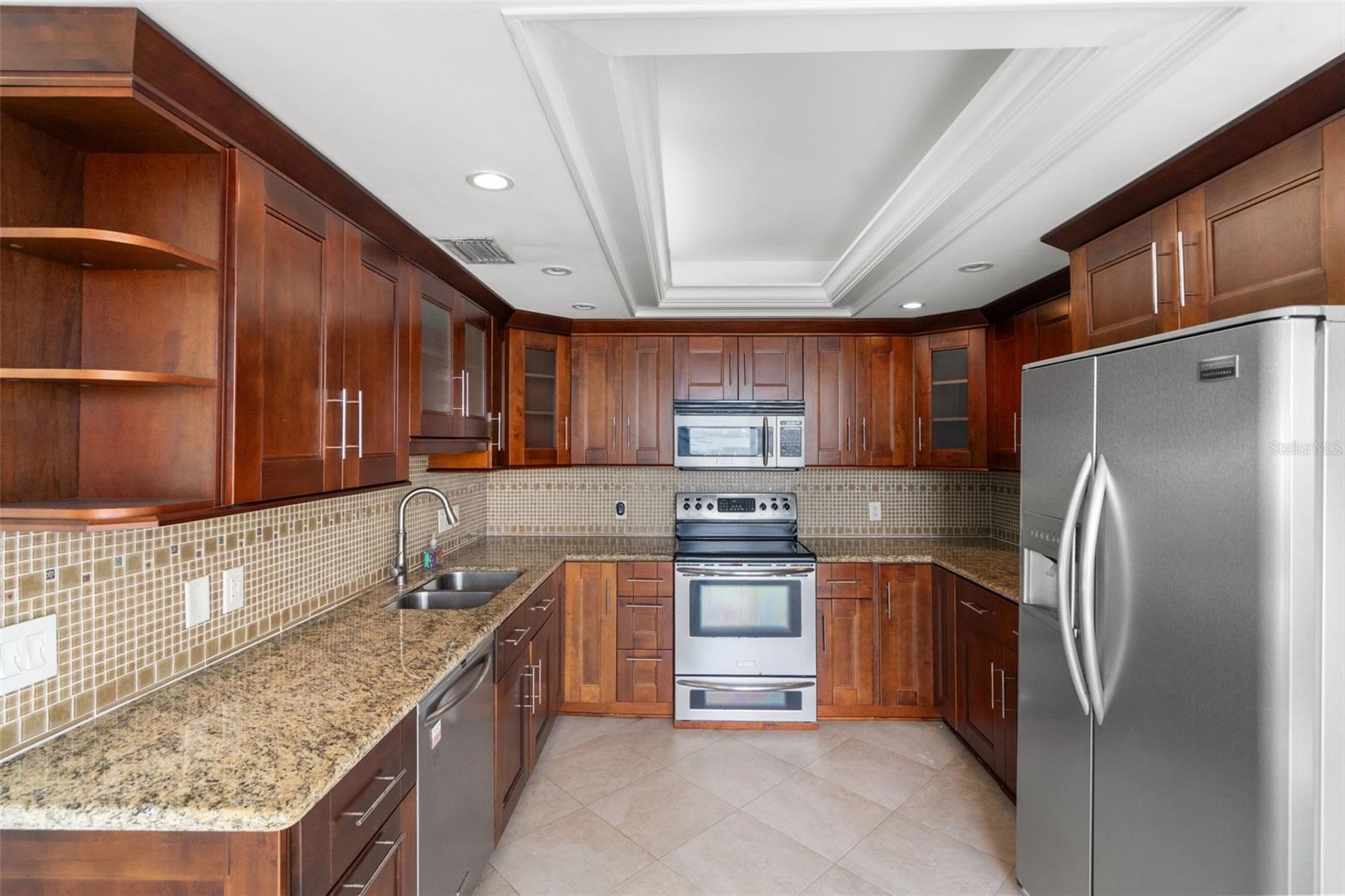 Cherry cabinets with granite countertops