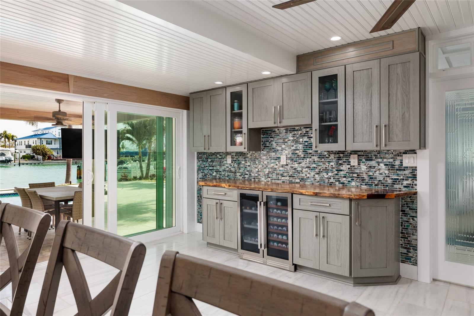 Live edge entertainment area with wine fridge