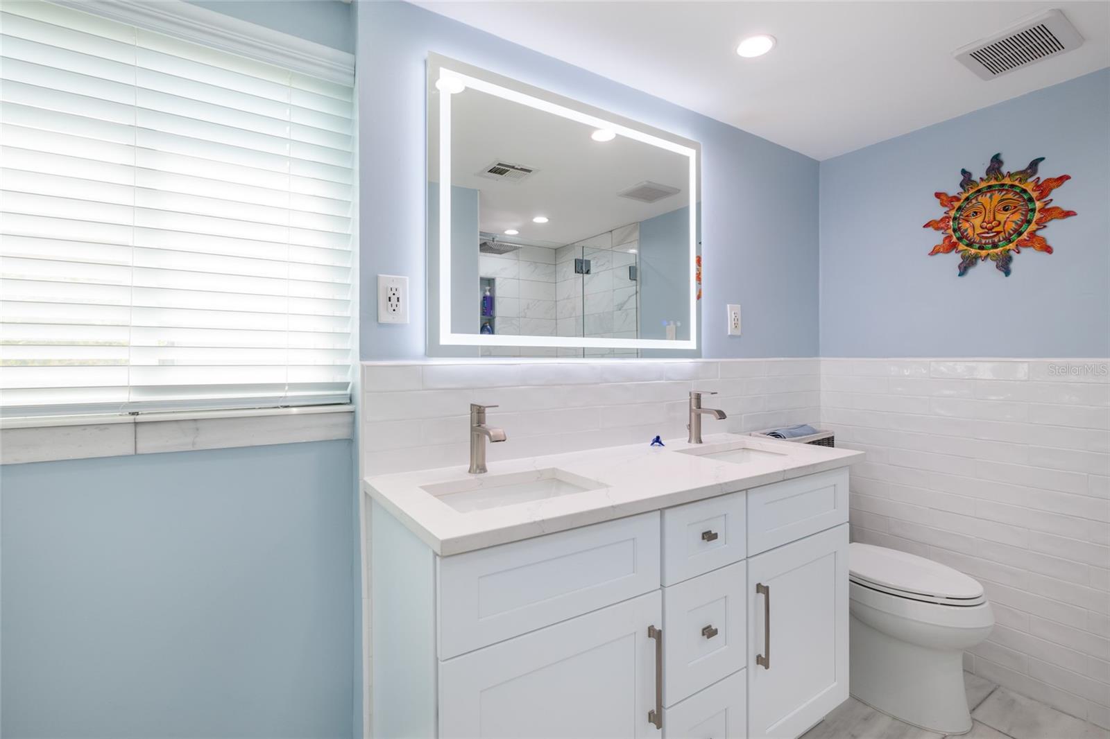 Double vanity with custom tile