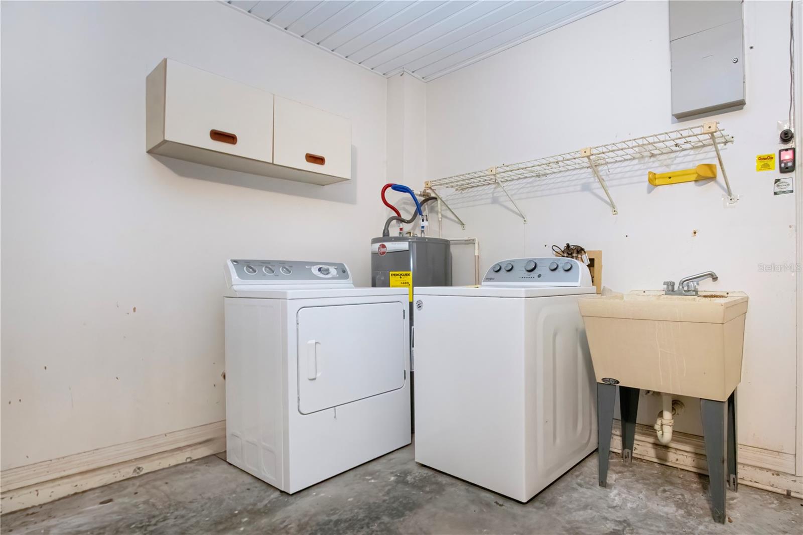 Washer/Dryer, laundry tub in garage- can be relocated to the current bonus room/home office