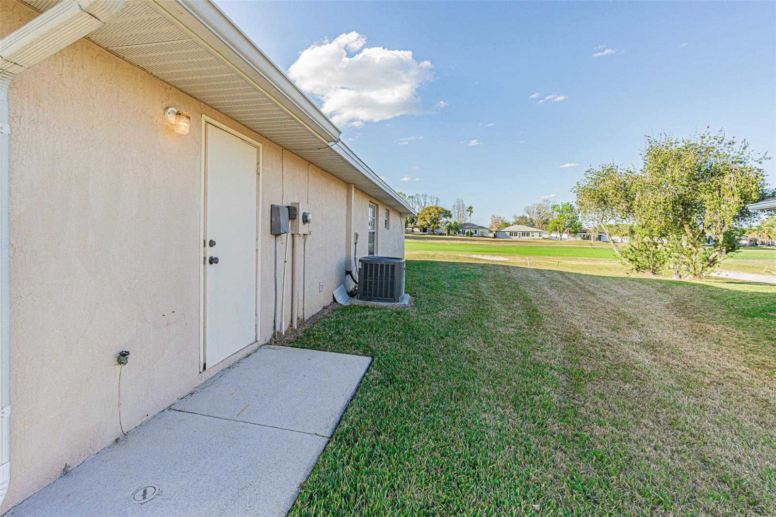 Side exit door from 2 car garage to sideyard