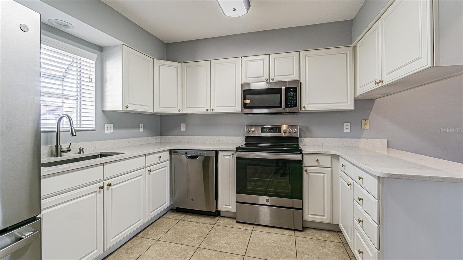 Light, Bright kitchen with pass thru to dining area