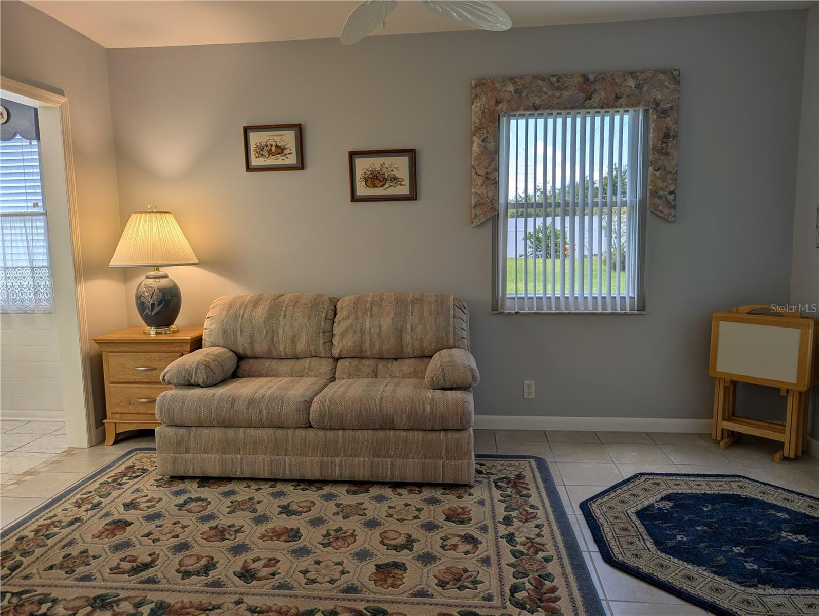 Bonus room is versatile space that adapts to the needs of the homeowner.  Great view of the private backyard.