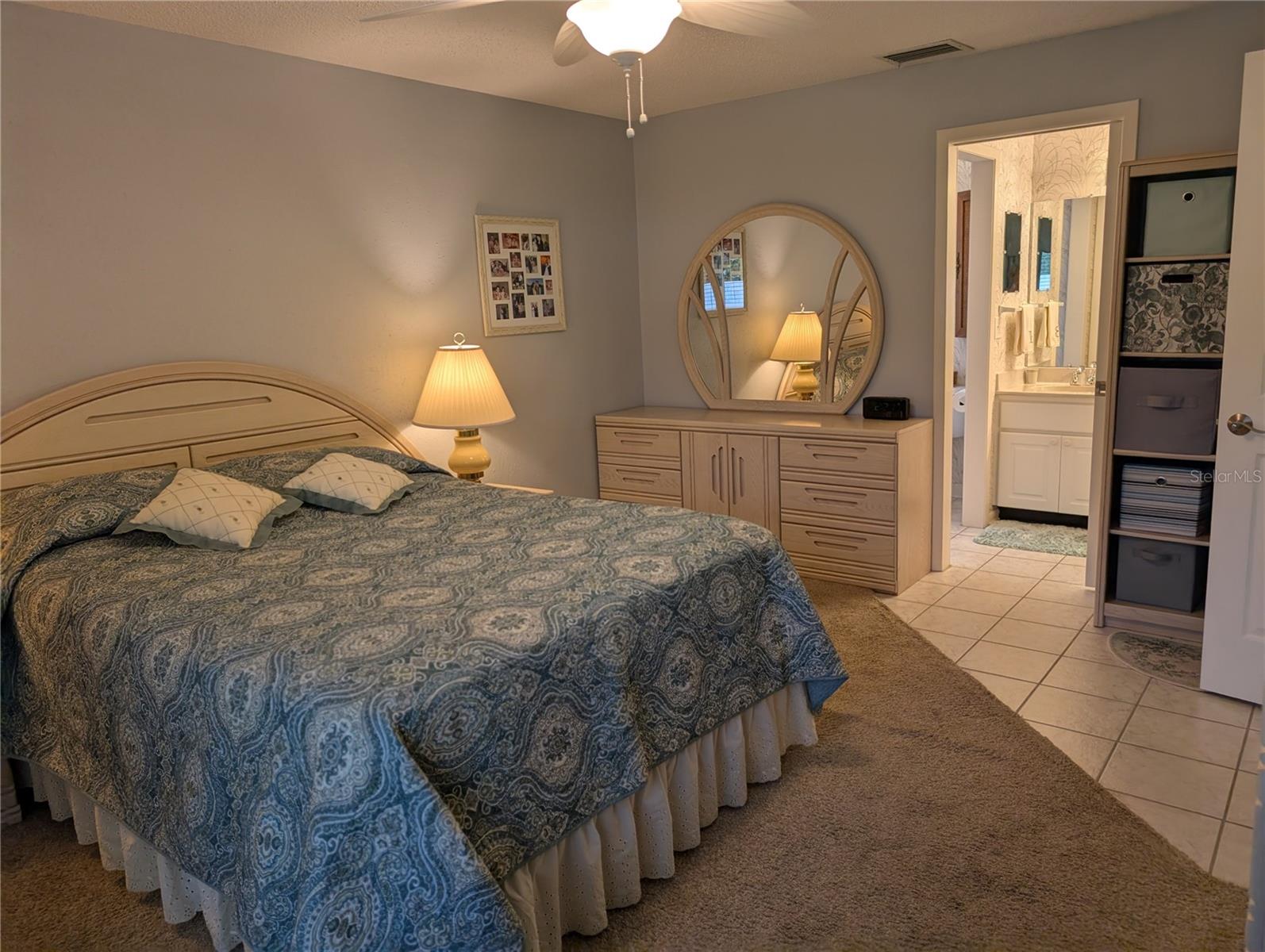 Primary bedroom offers a private ensuite bathroom.