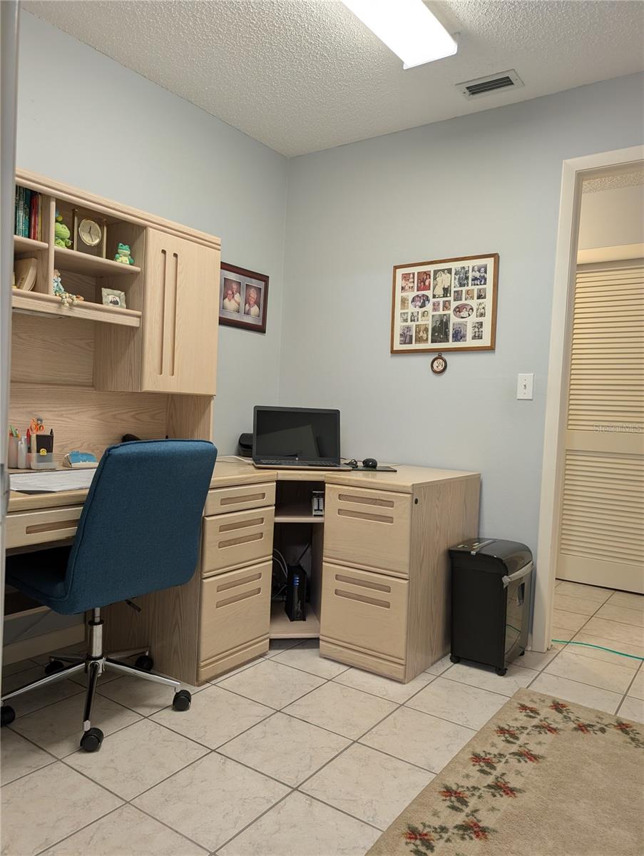 View thru office from garage to hallway.