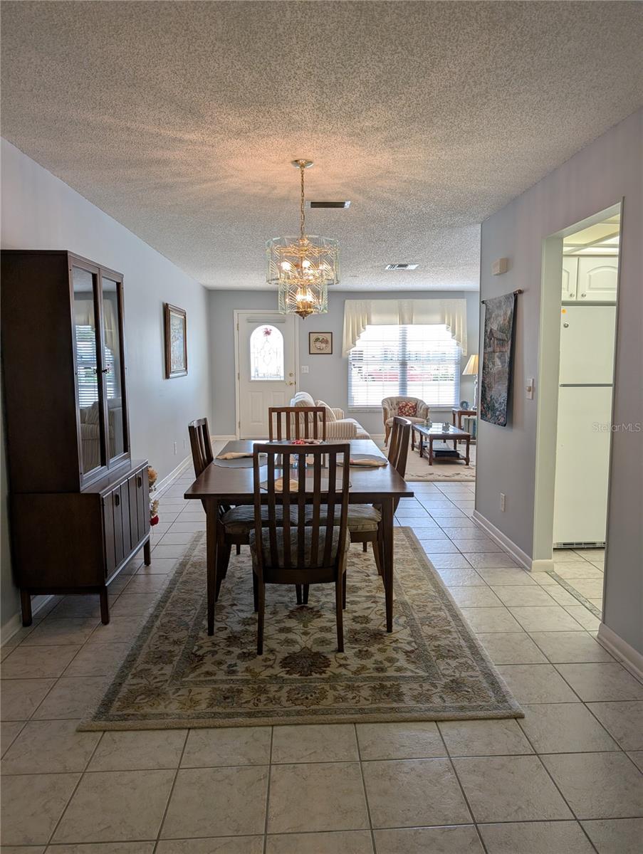 View from Florida room thru dining to front entry.  Interior tour is complete.  Let's explore the exterior.