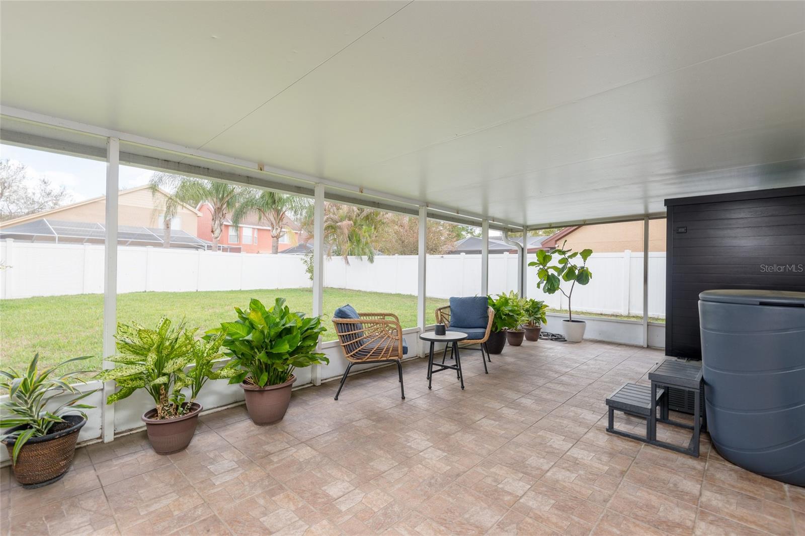 Lots of living in the updated screened-in porch
