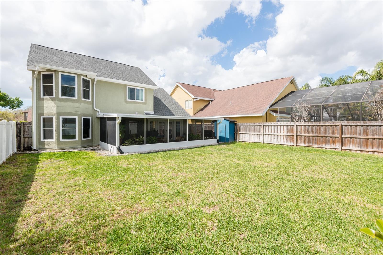 Backyard with large lanai