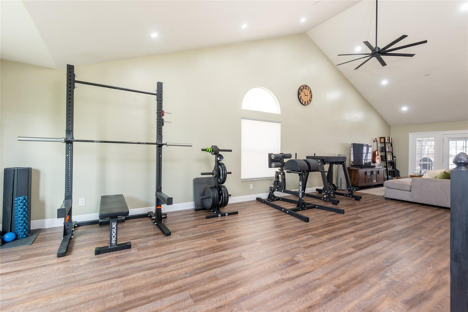 Living area being used as a workout center