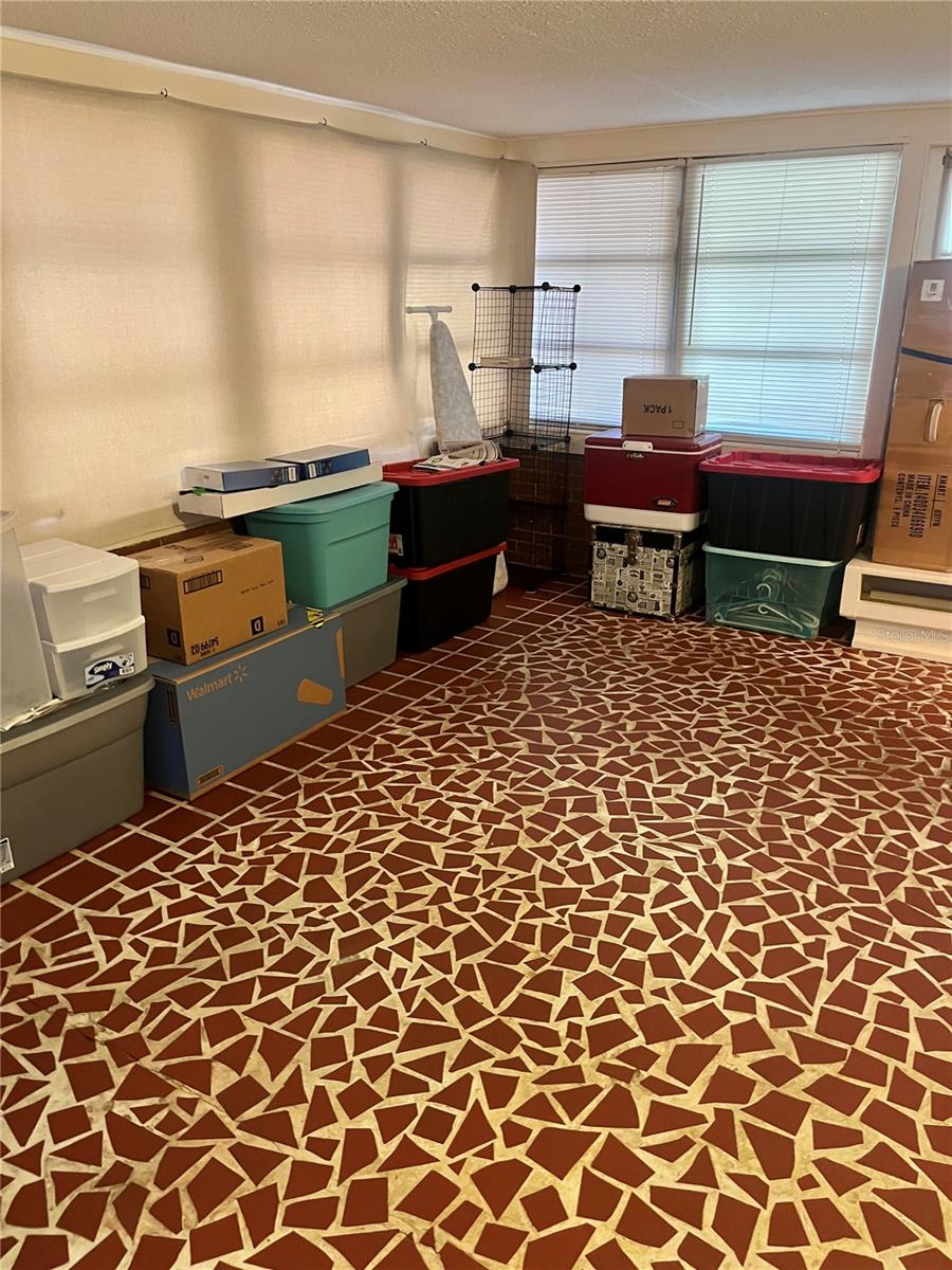 Family room/Art Studio with wrap around windows- 21ft by 11ft