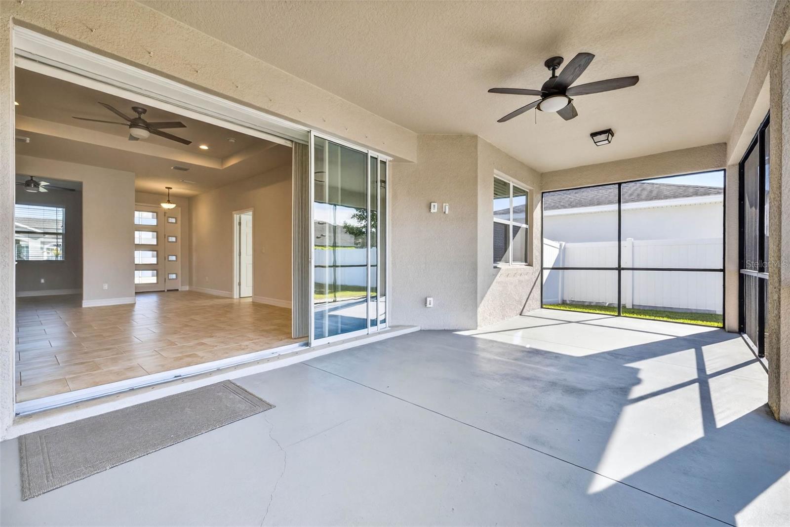 Screened Lanai to great room with pocket sliders