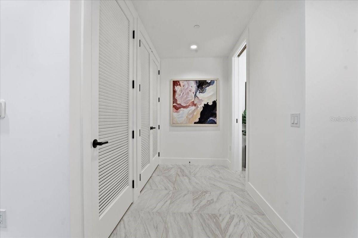 UTILITY CLOSET, HALF BATH AND LAUNDRY ROOM