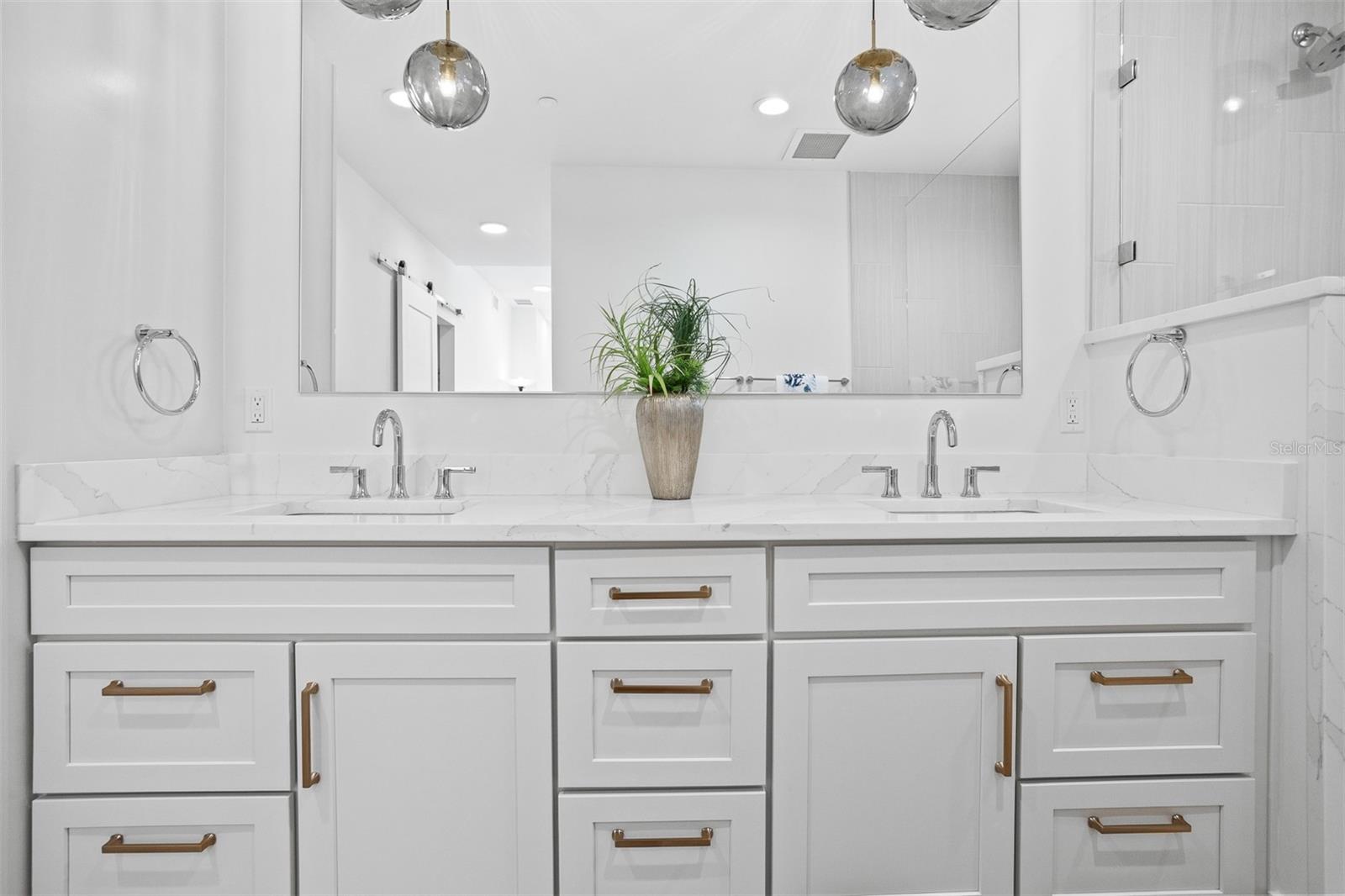 Primary Bath with double sinks and large, walk-in shower