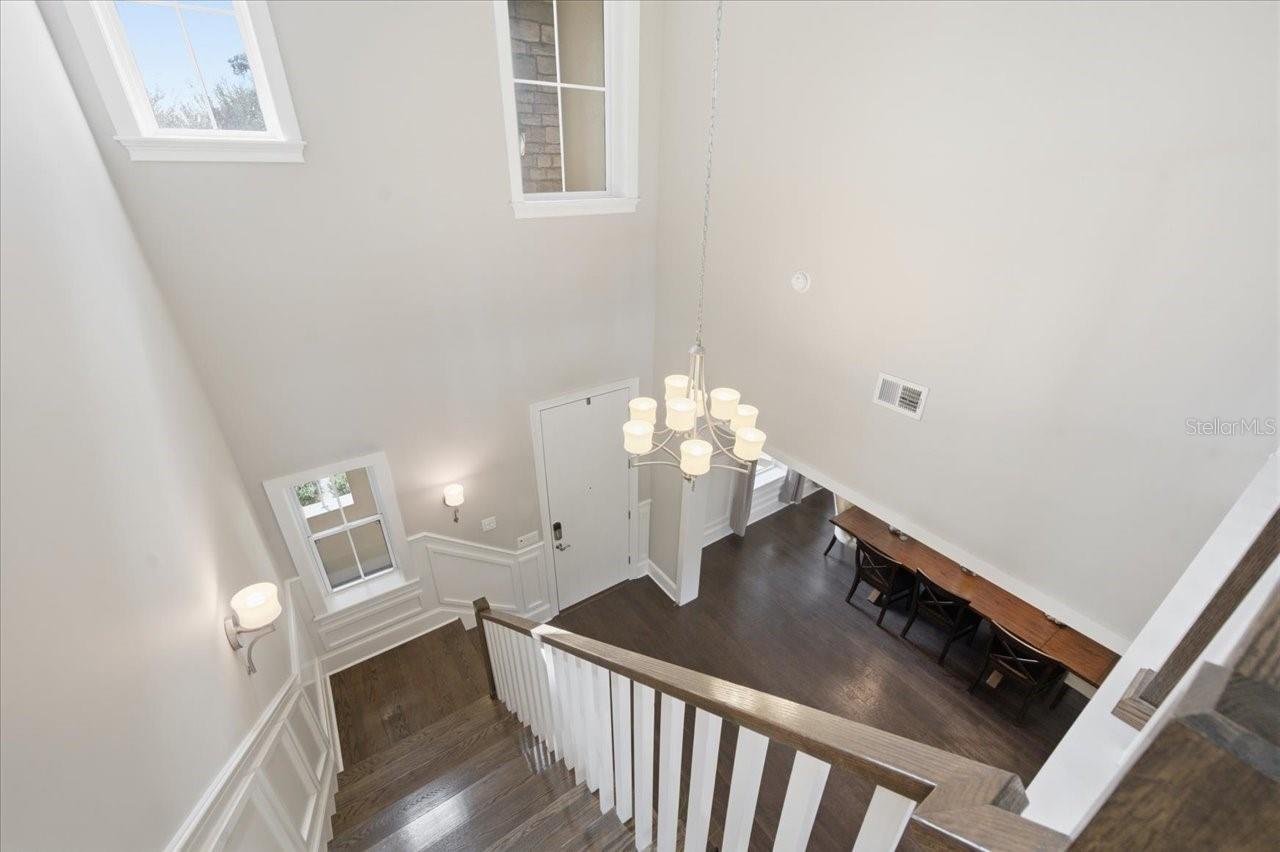 Gorgeous Wood stairs with painted wood rails