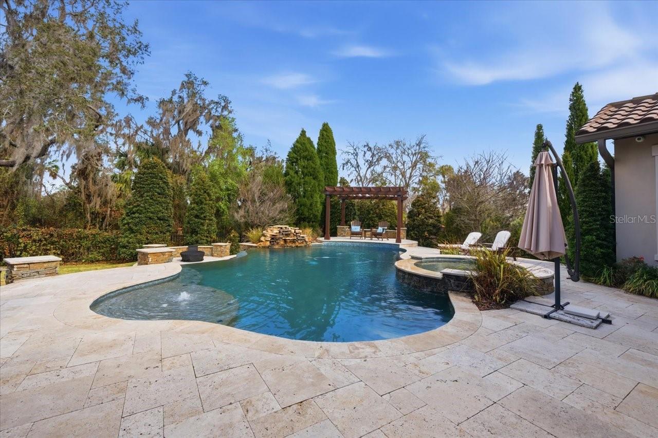 Exquisite custom pool with spa