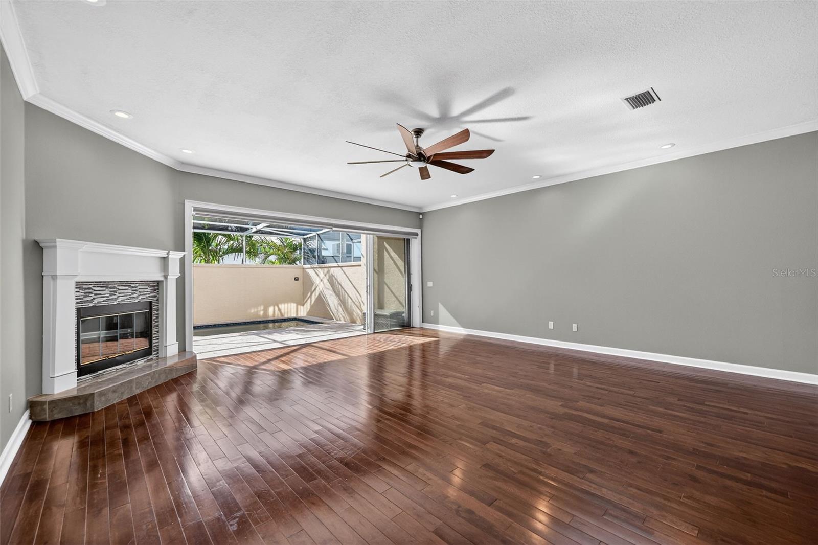 Primary Bedroom is large and spacious and has sliding doors with a private balcony