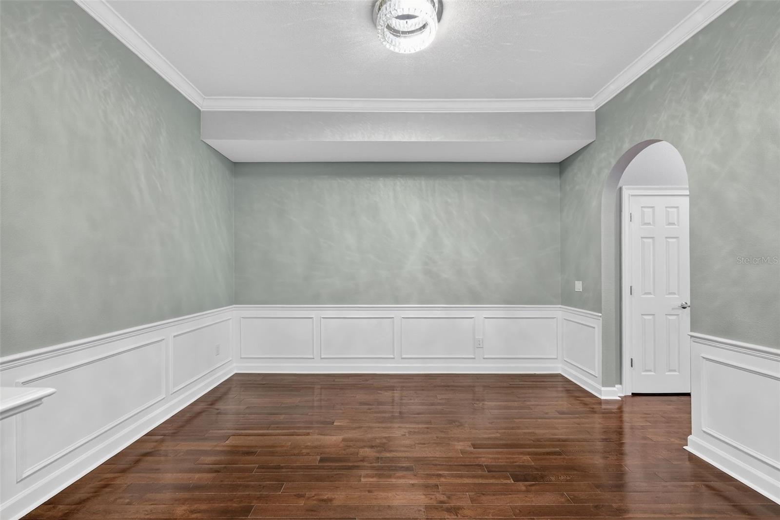 Beautiful entry door and to the right is the door leading into your garage and hallway to half bath