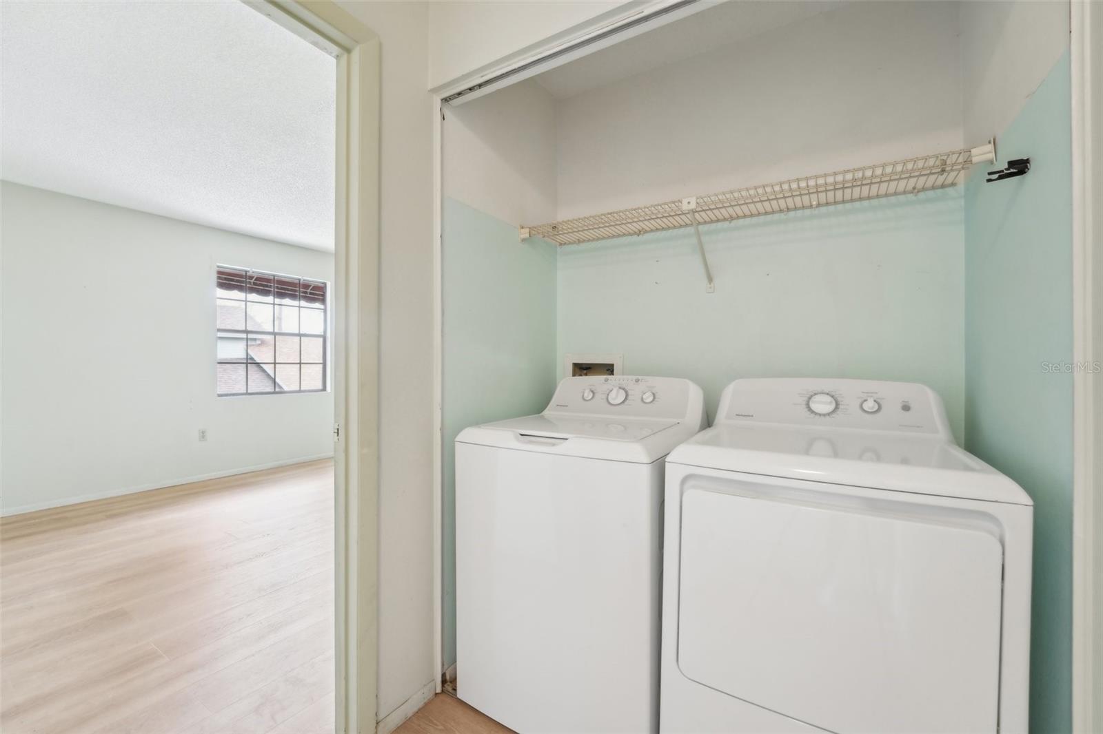 Recently installed washer dryer conveniently located upstairs