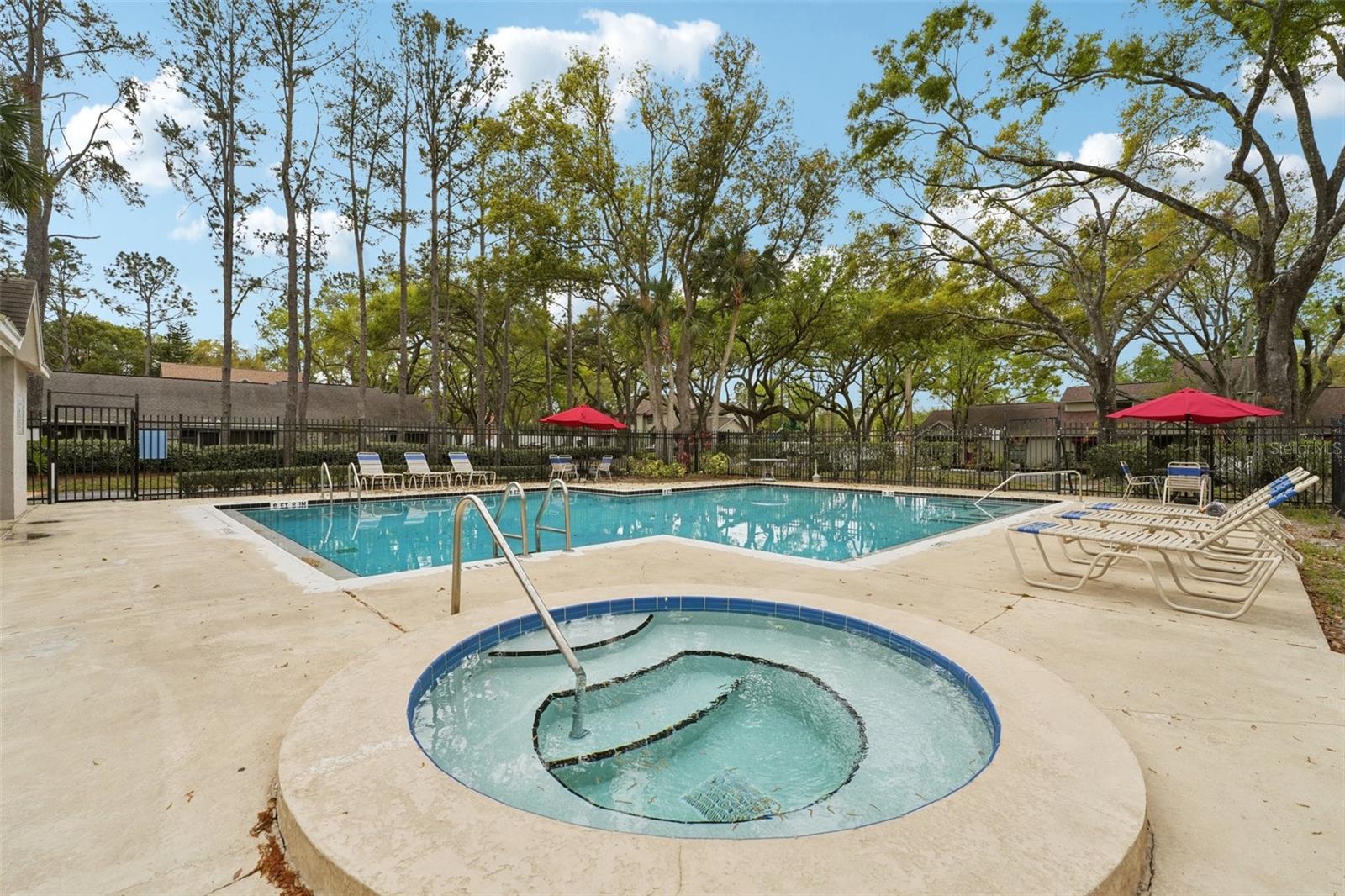 Hot tub and pool right outside your unit