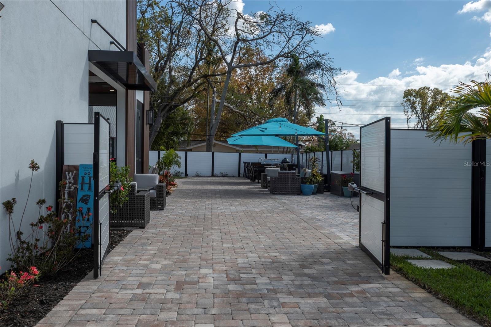 Driveway Entrance into the Backyard - Lots of Room for Your Toys