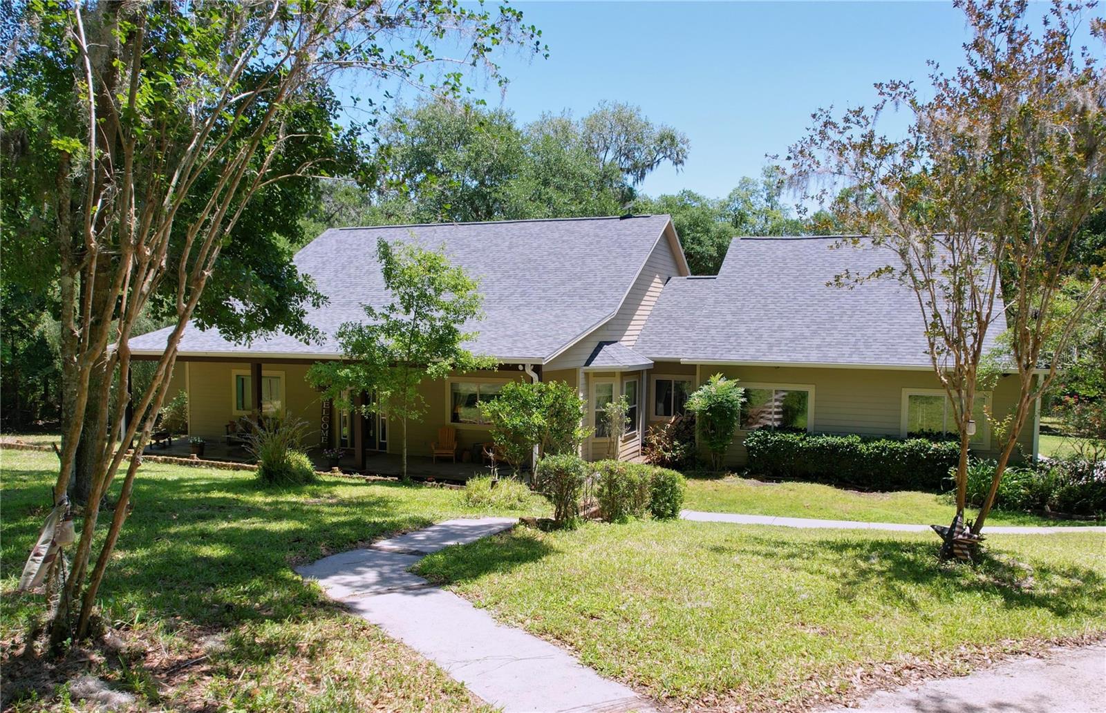 FRONT - LAND IS SLOPED TOWARD THE REAR