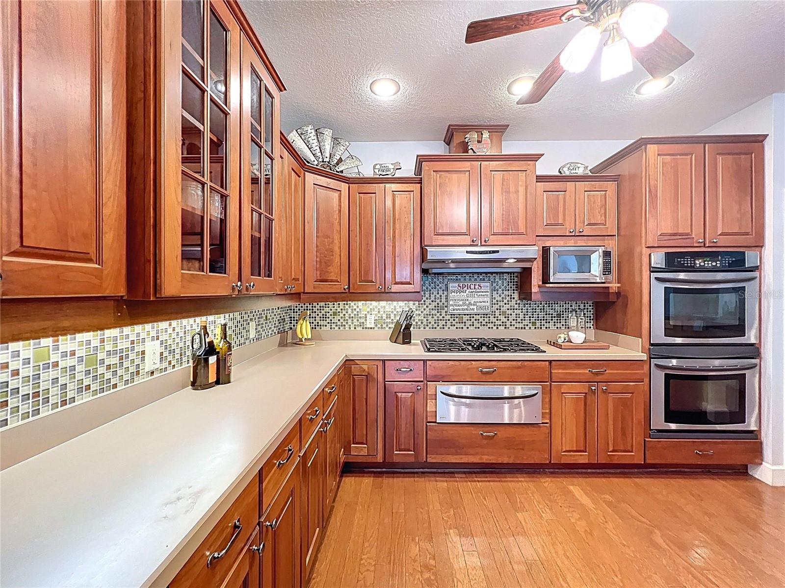 KITCHEN WITH GAS COOKTOP & SOLID COUNTERTOPS