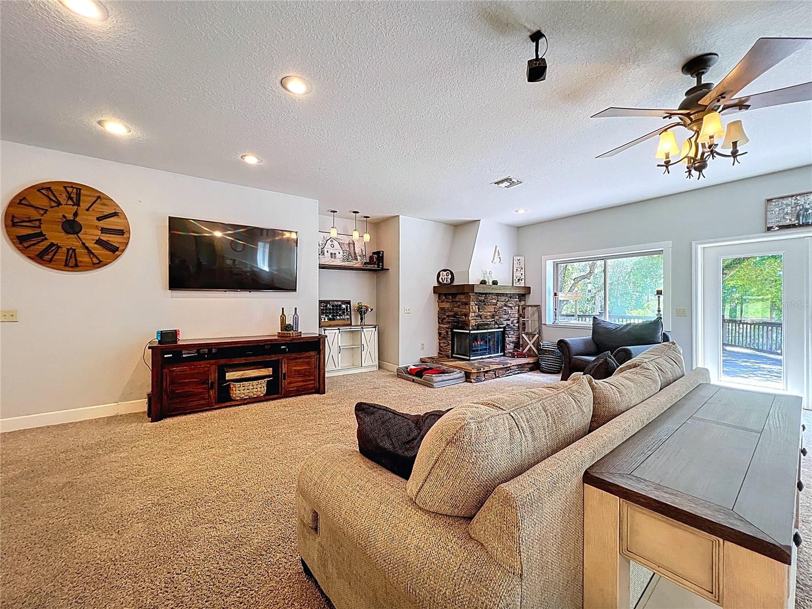 LOTS OF LIGHT COMING FROM THE BACK PORCH AREA