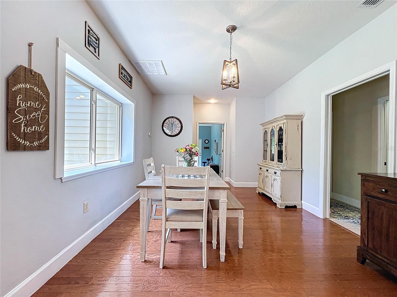 TO THE RIGHT IS THE LAUNDRY ROOM AND GARAGE, AT THE END OF THE ROOM IS THE ENTRANCE TO THE GUEST SUITE WITH PRIVATE ENTRANCE/3RD BEDROOM