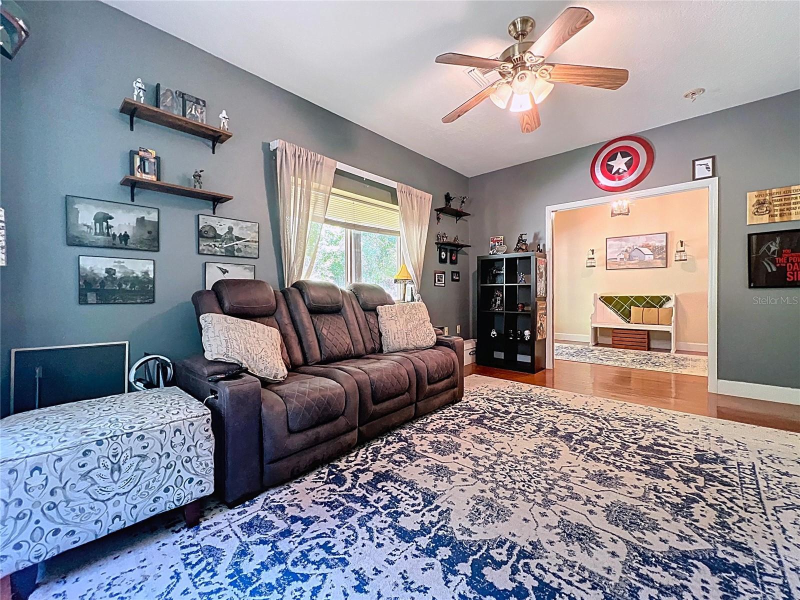 BUILT IN POCKET DOORS ALLOW THIS ROOM TO BE CLOSED OFF TO THE FOYER