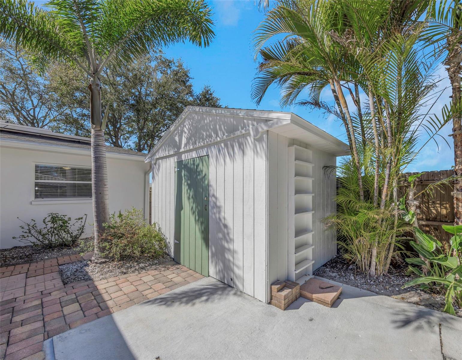 Large backyard shed is great for storage or a workshop.