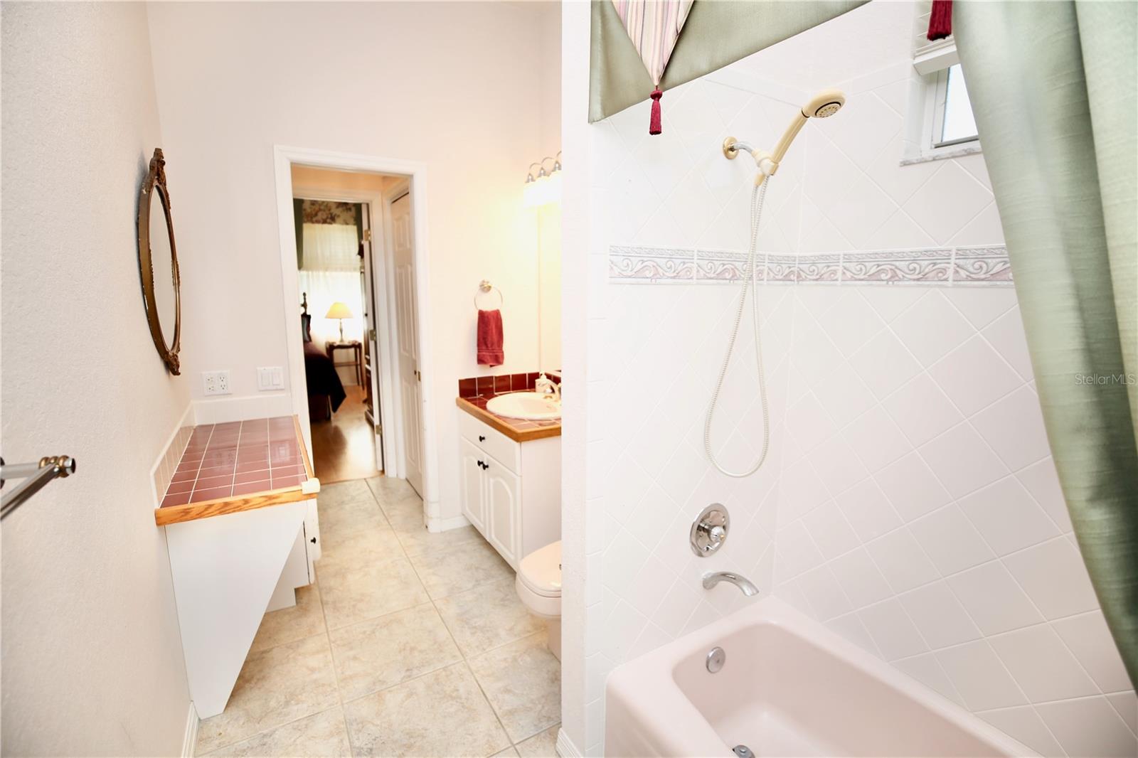 Guest En Suite bathroom with private entrance and pocket doors