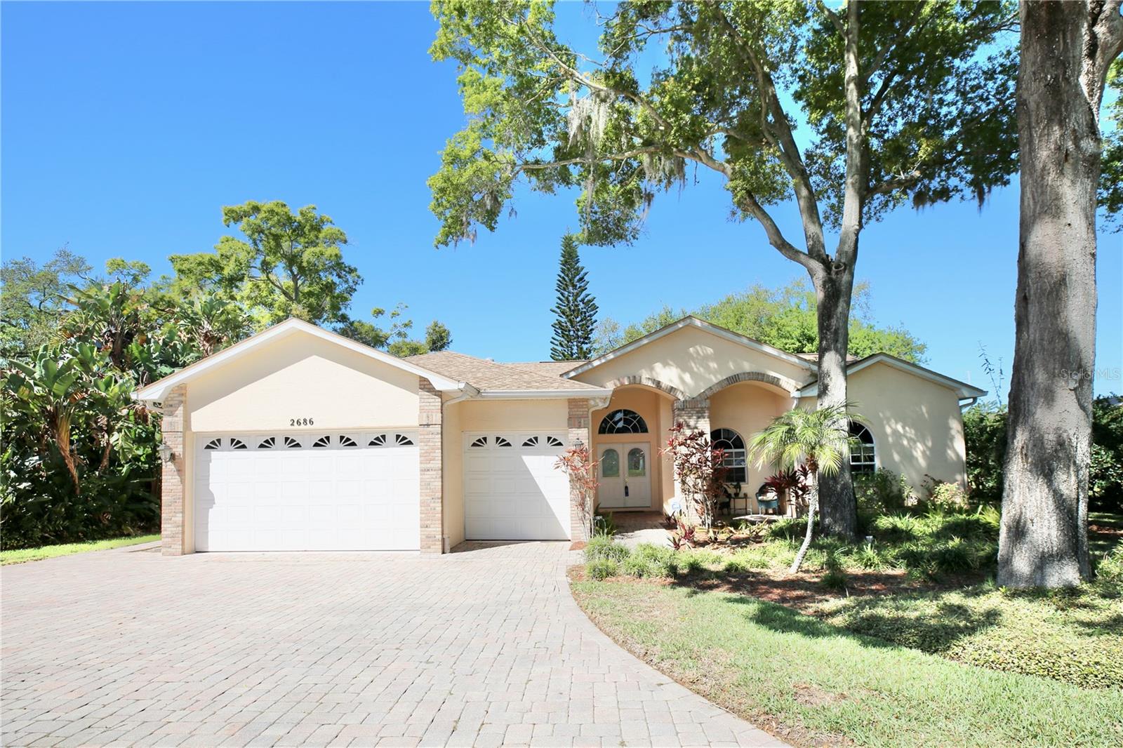 Lovely Roundtop windows and multiple roof lines adorned home with such attention to detail