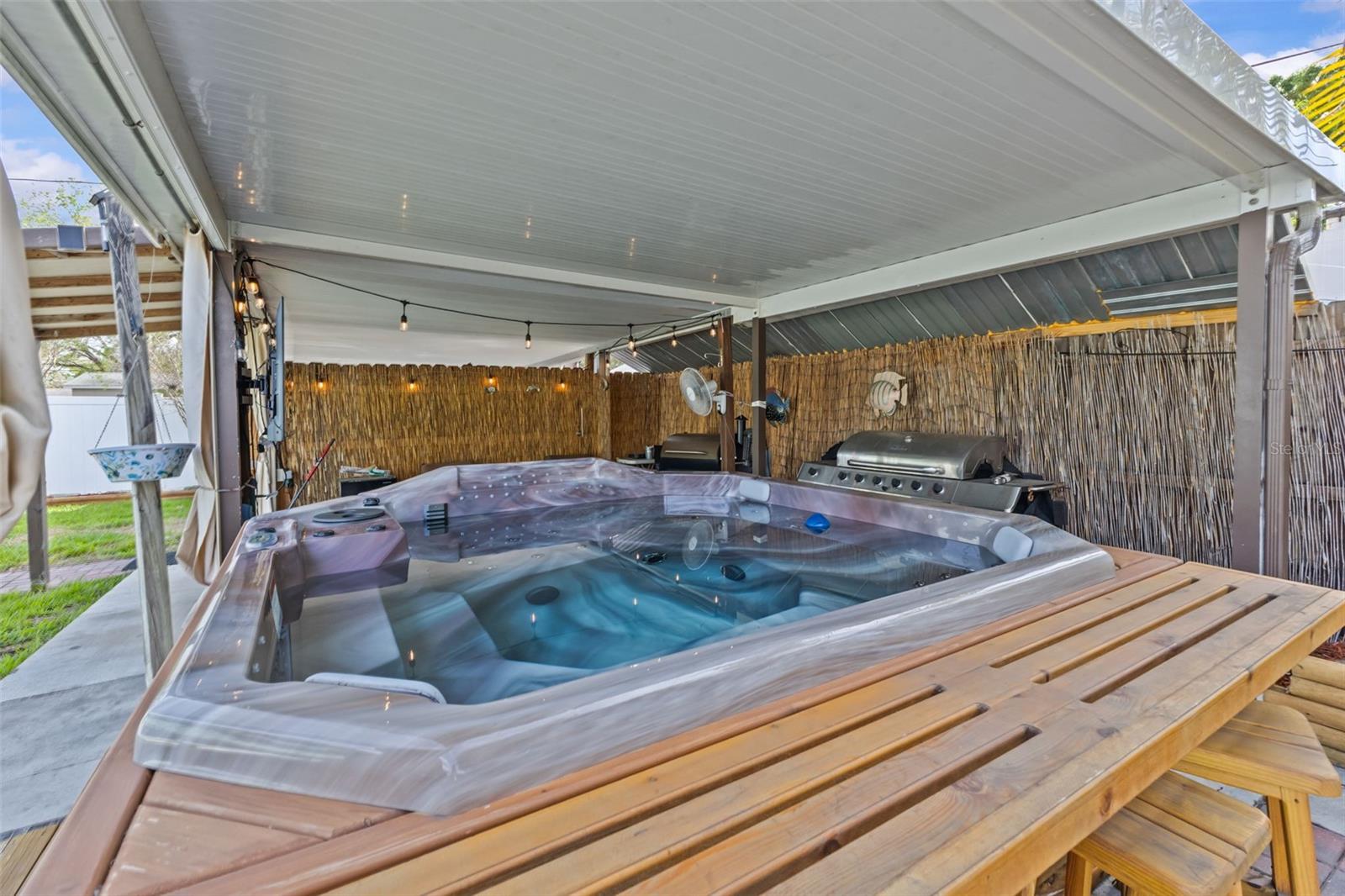 Covered Spa and BBQ Area