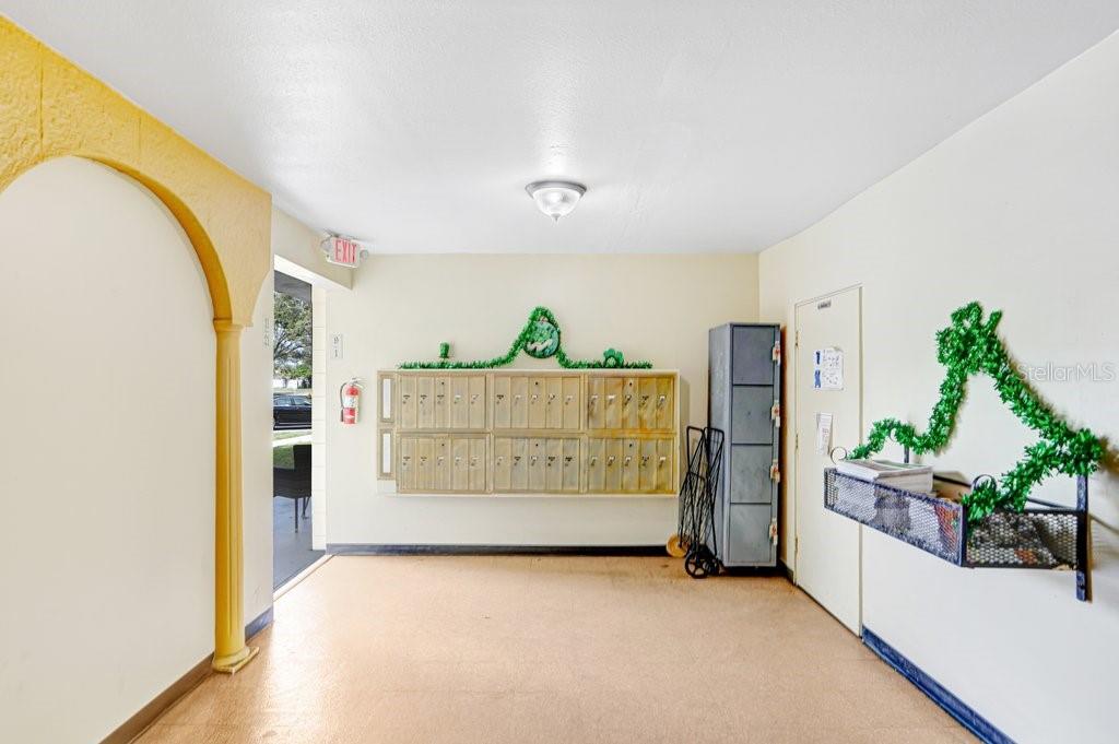 TB8482210 - As you enter, mailboxes on left wall