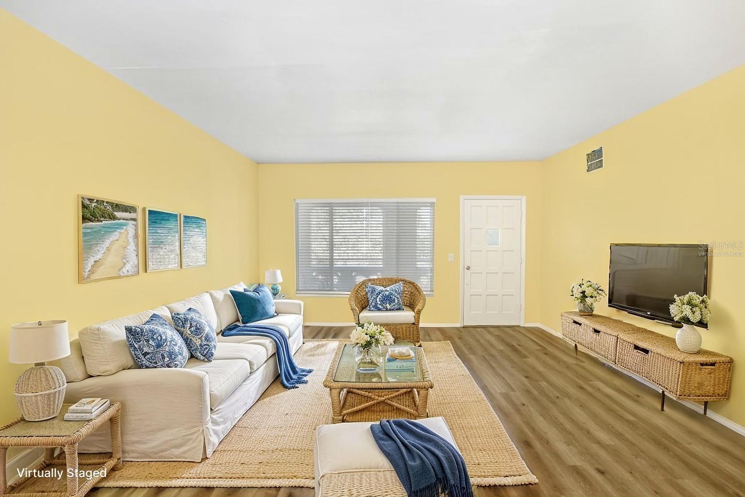 TB8482210 - Walk-in to the living room - virtually staged