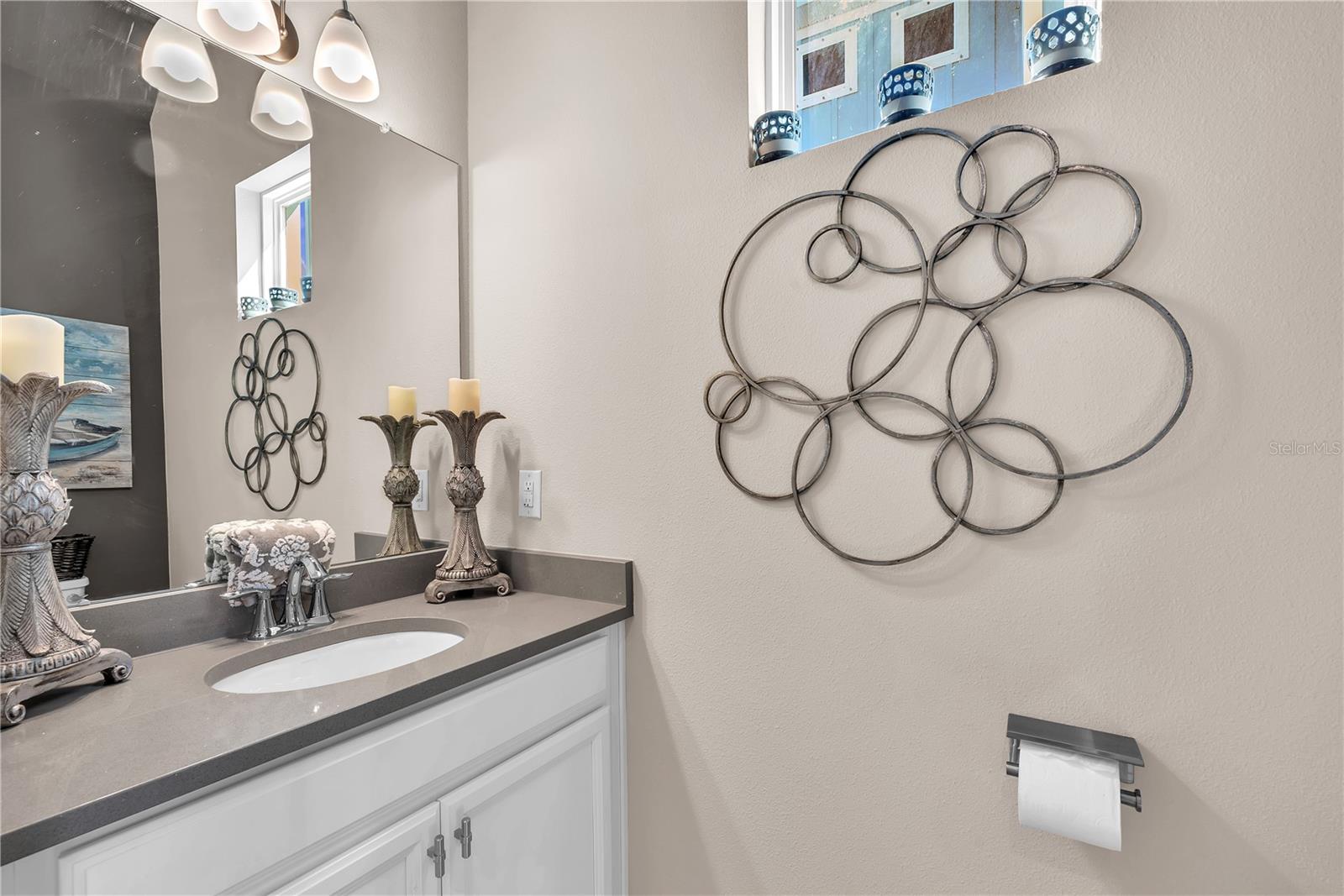 A convenient first-floor half bath allows you to skip the stairs.