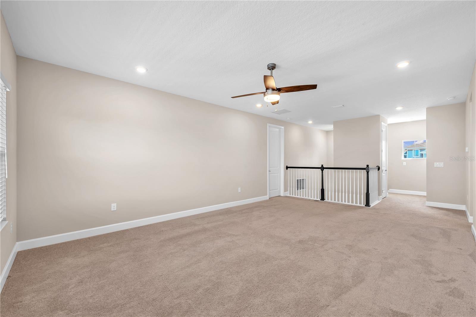 Bonus room has a large closet at the top of the stairs.