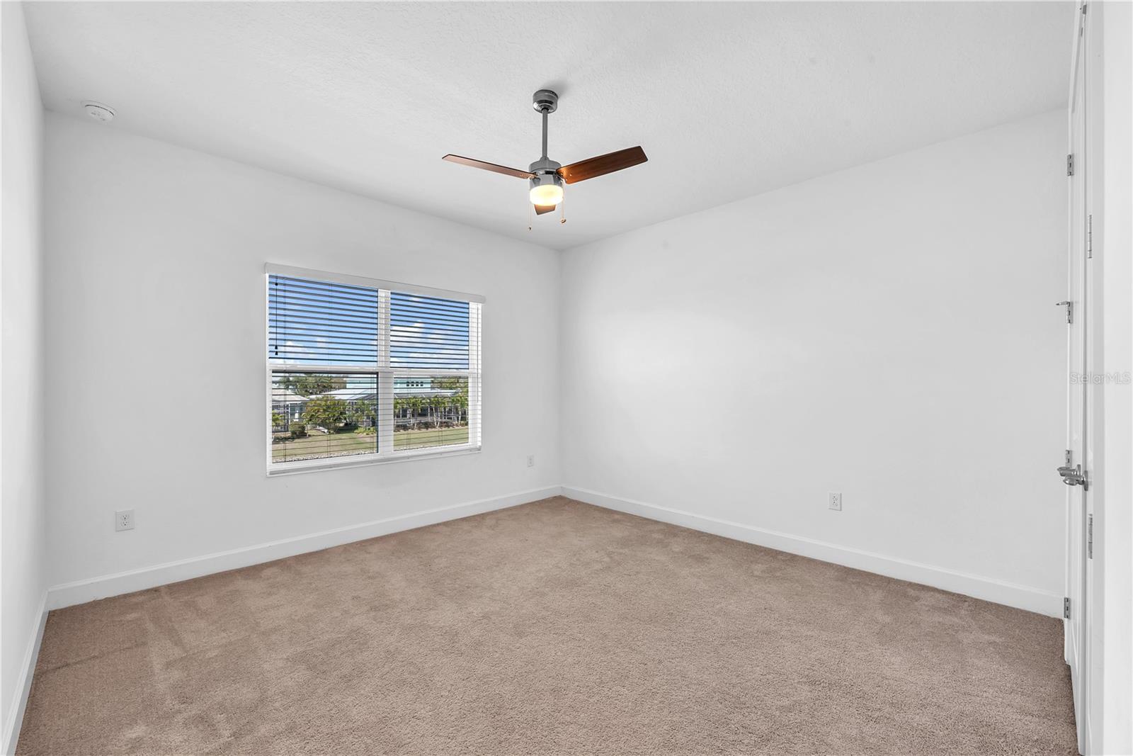 A secondary suite with its own private bath and wlak-in closet is  ideal for guests or multi-generational livin