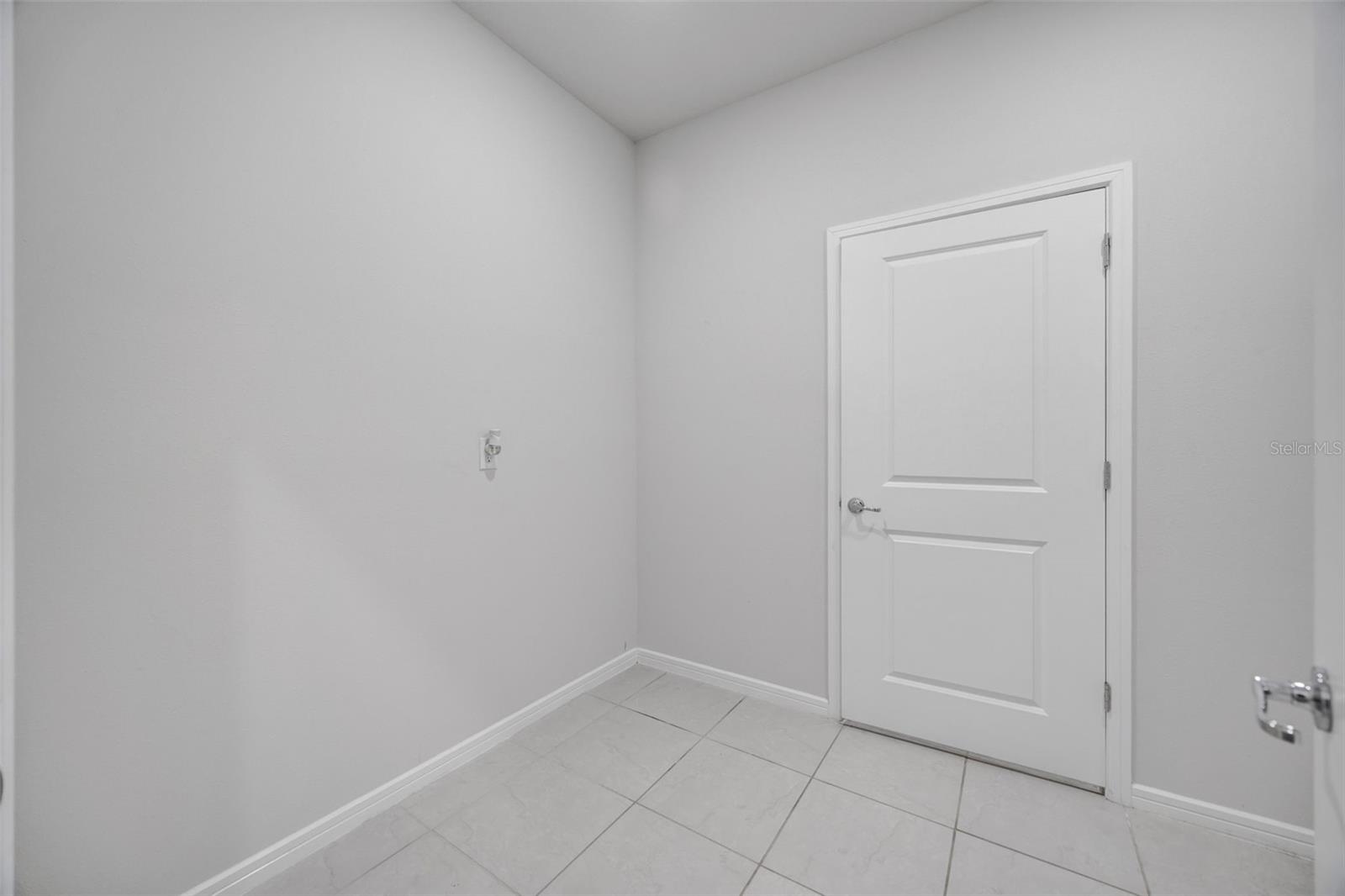 Laundry Room With Storage Closet