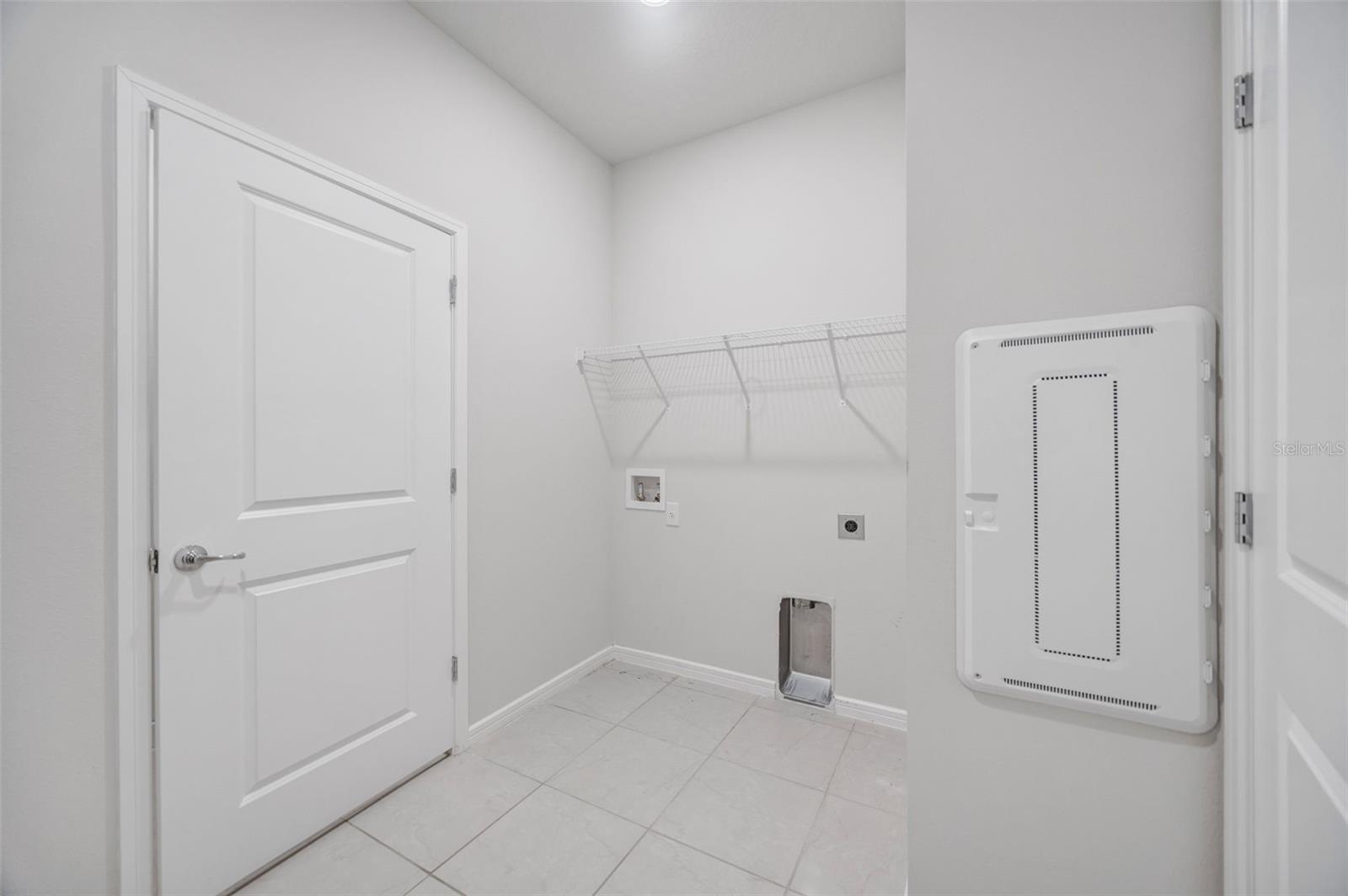 Laundry Room With Storage Closet