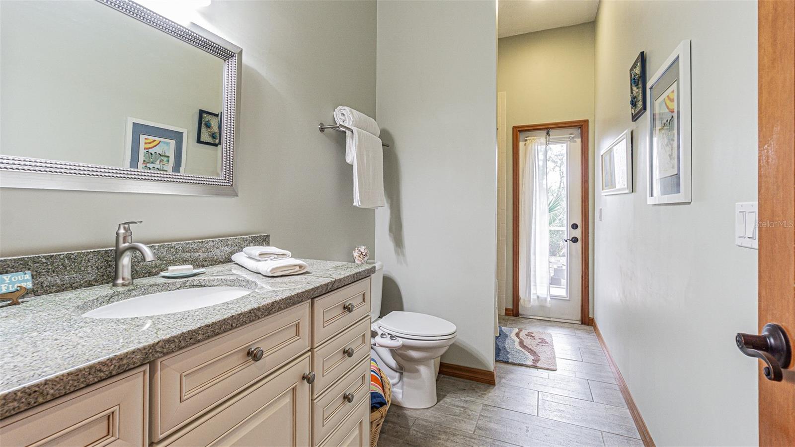 Guest Bath - Pool Bath Same Granite as Kitchen and Primary Bath