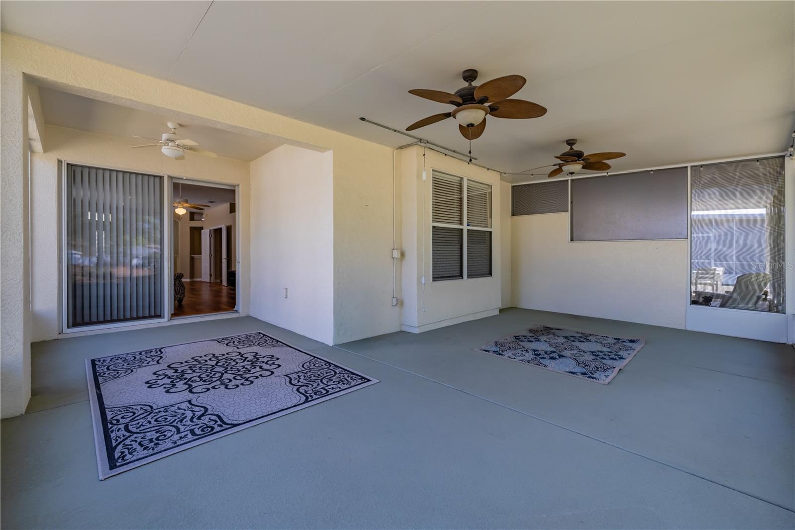 Can you picture yourself entertaining or just relaxing on this 350 sq ft covered/screened patio?!
