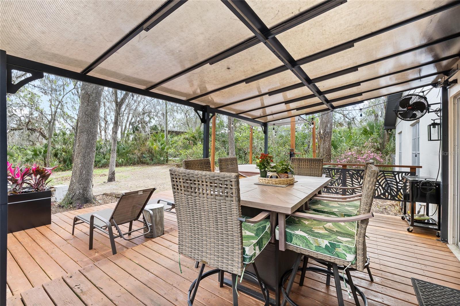 Relaxing patio with new hot tub (conveys)