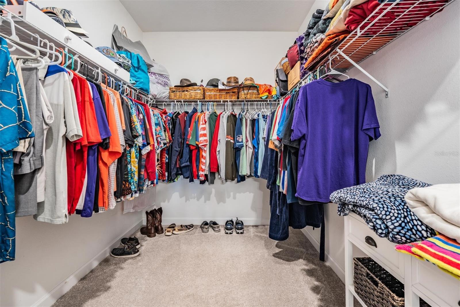 Huge walk-in closet in primary bedroom