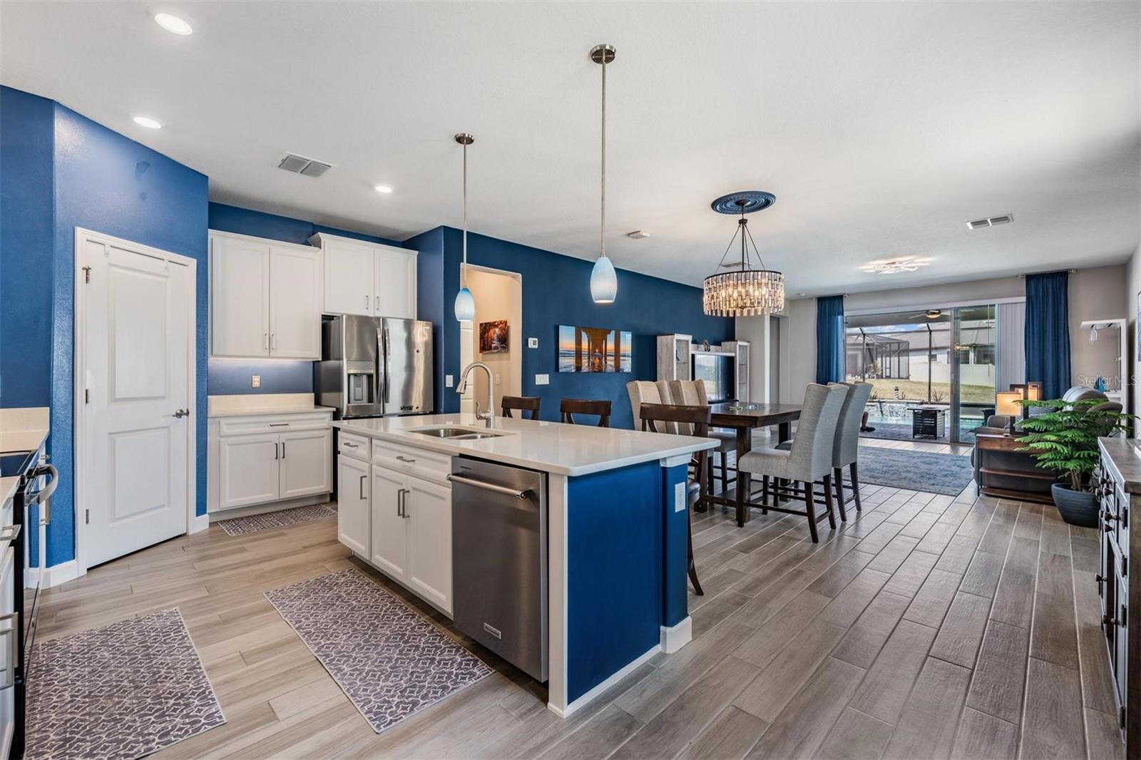 Spacious living area is open to kitchen