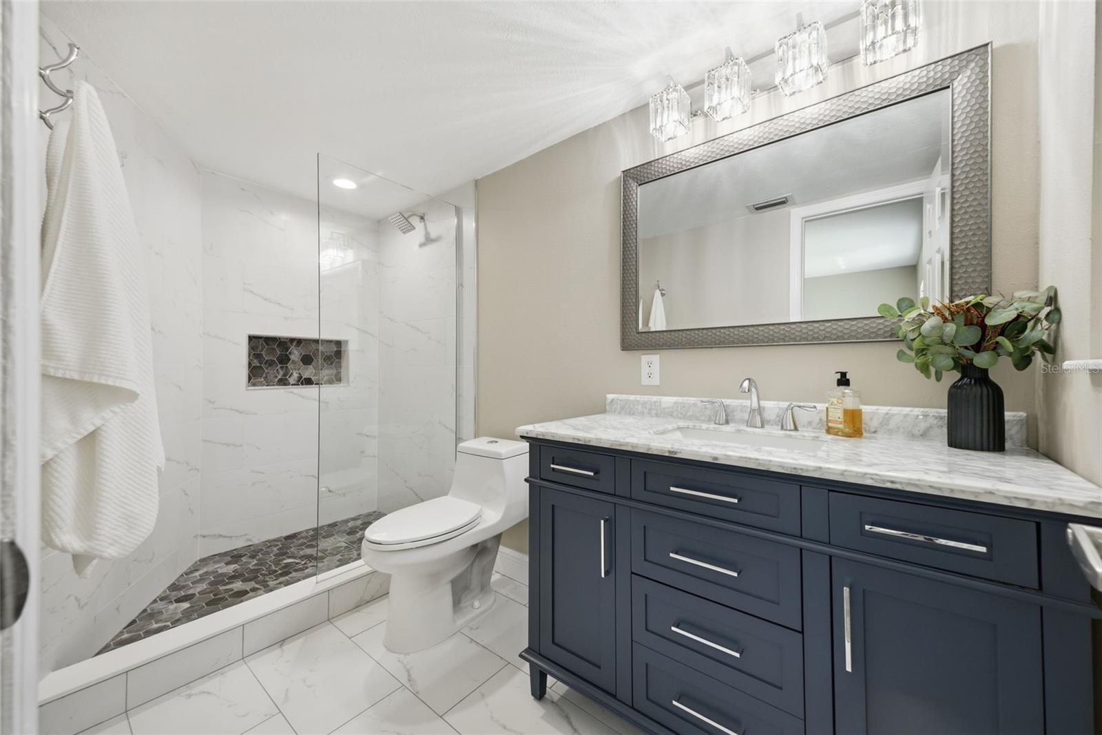 Second primary/guest ensuite bathroom.