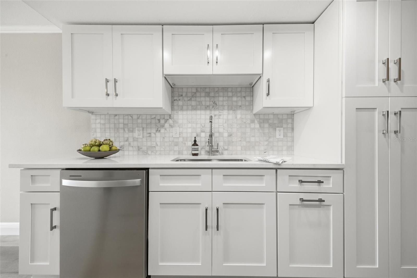 Carrera marble backsplash.