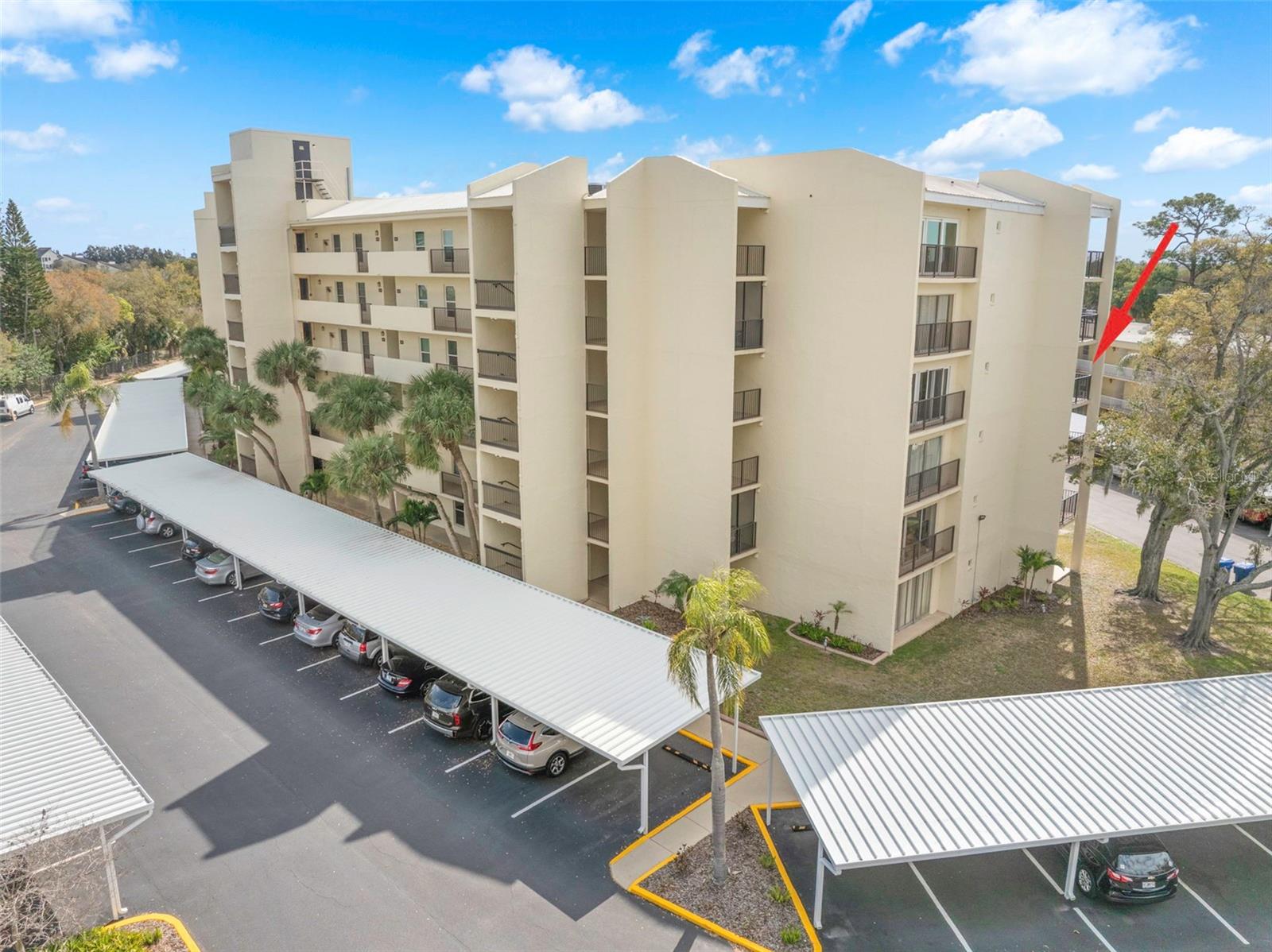Carport #18 is conveniently located facing the building between the elevator and the stairs.