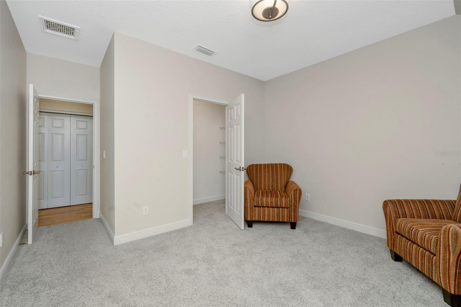 Bedroom 2 with walk-in closet.