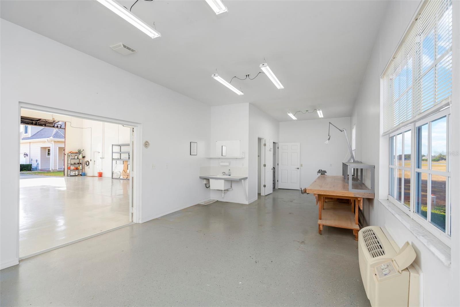 Large Workshop in Hangar with 1/2 Bath